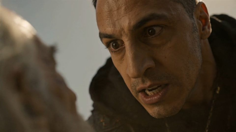 Close-up of a menacing hunter's face